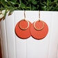 Burnt Orange Disc & Brass Dangle